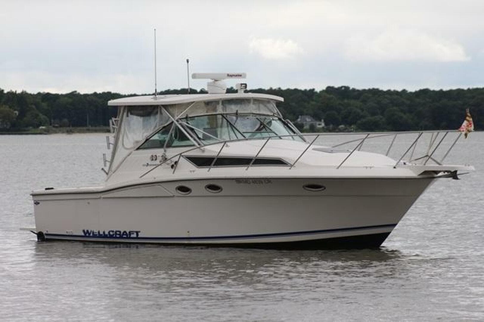 1996 Wellcraft 3300 Coastal — photo 1
