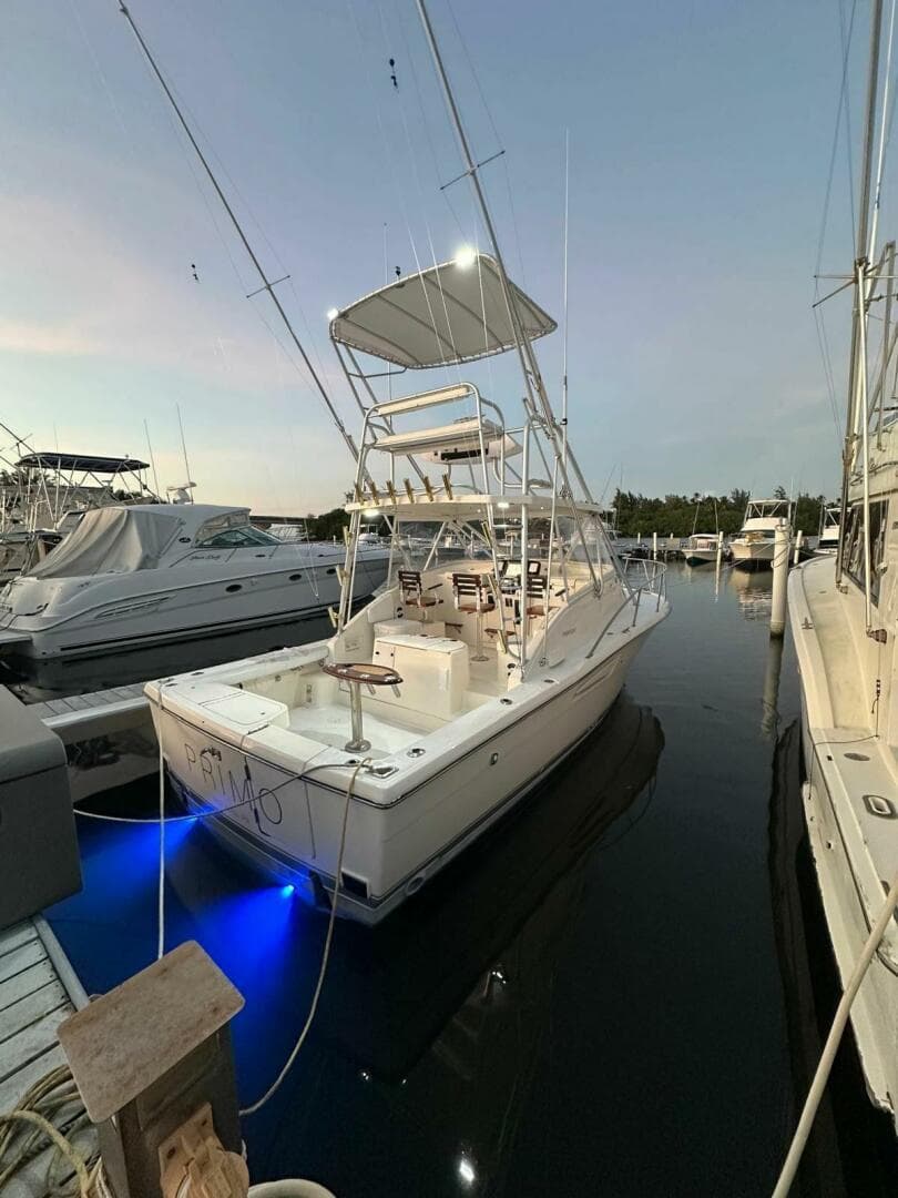 1997 Pursuit 3000 Offshore Express — photo 1